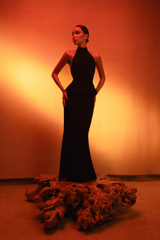 LUCE Woman in a black halter neck set tailleur pret a couture collection