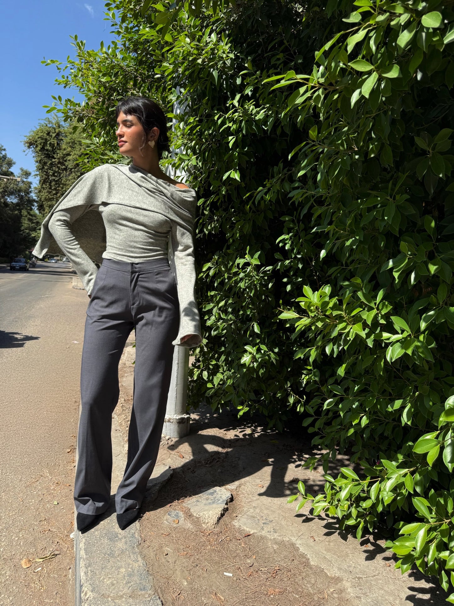 LUCE girl wearing grey tailored pants