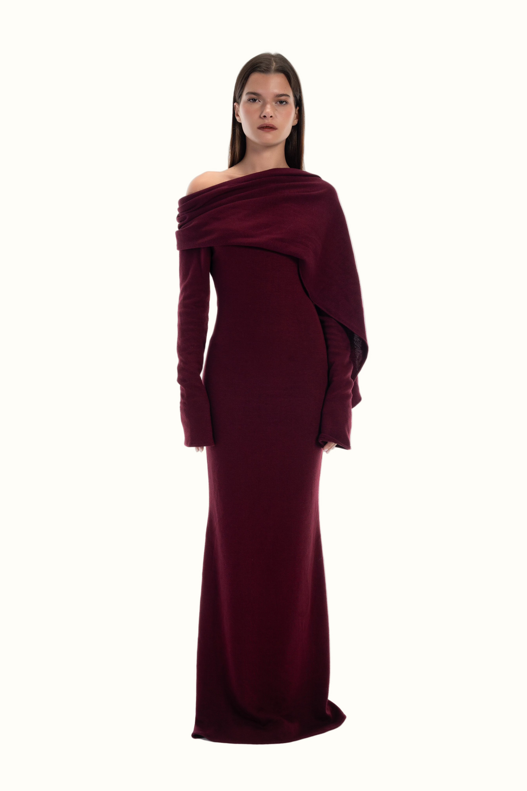LUCE woman wearing Burgundy off-shoulder knit maxi dress with a scarf detail attached on a white background